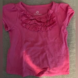Pink ruffled shirt
